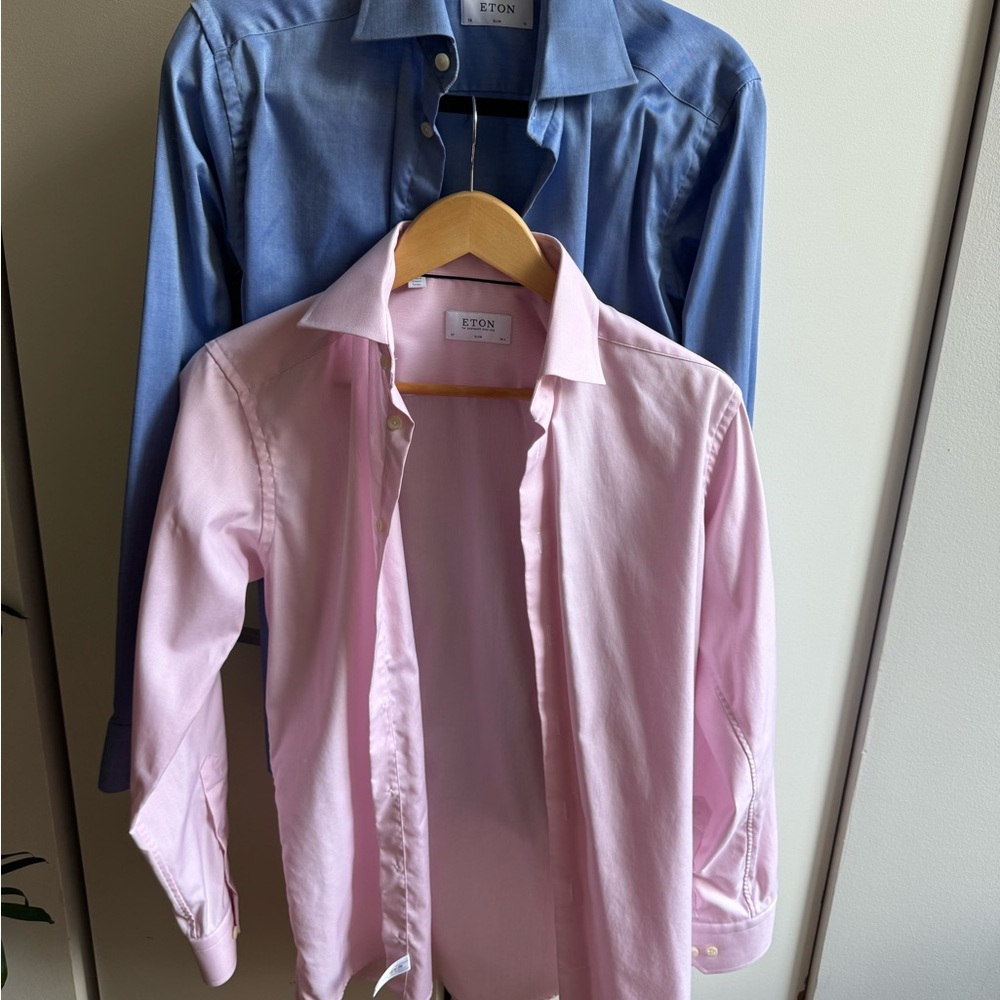 Two Eton cotton dress shirts. Worn only a couple of times. Sizes 15 and 14.5